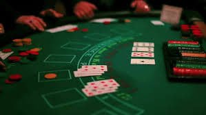 Filipino player using boss77 mobile app on smartphone for sports betting and live casino